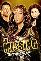 Vivica A. Fox, Mark Consuelos, and Caterina Scorsone in 1-800-Missing (2003)