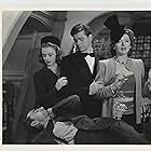 Myrna Loy, Donna Reed, and Barry Nelson in Shadow of the Thin Man (1941)