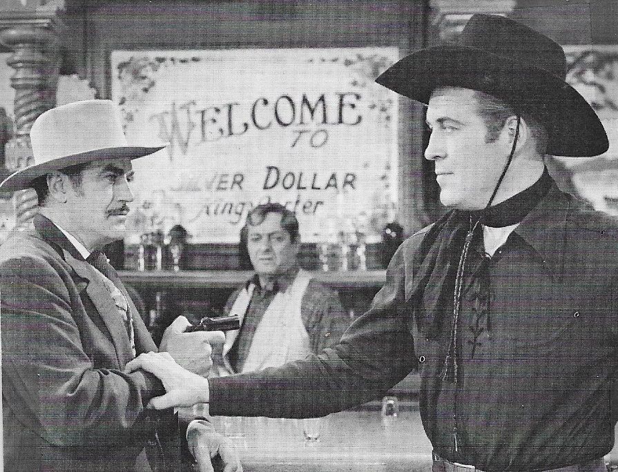 Harold De Becker, Dick Foran, and Harry Woods in Winners of the West (1940)