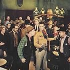 Victor Adamson, Barney Beasley, Budd Buster, Rube Dalroy, Kit Guard, Fuzzy Knight, Earl Phelps, Norman Phelps, Willie Phelps, Jack Randall, Ray Whitley, The Phelps Brothers, and Six-Bar-B Cowboys in Where the West Begins (1938)