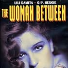 Lili Damita and O.P. Heggie in The Woman Between (1931)