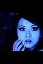 Calina Chan in Armin van Buuren: Blue Fear (2009)