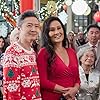 Tia Carrere and Yee Jee Tso in A Big Fat Family Christmas (2022)