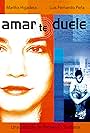 Luis Fernando Peña and Martha Higareda in Amar te duele (2002)