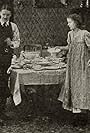 Robert Harron and Mae Marsh in The Little Liar (1916)