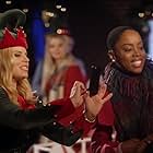 Megan Hilty and Nia Cummins in Santa's Boots (2018)