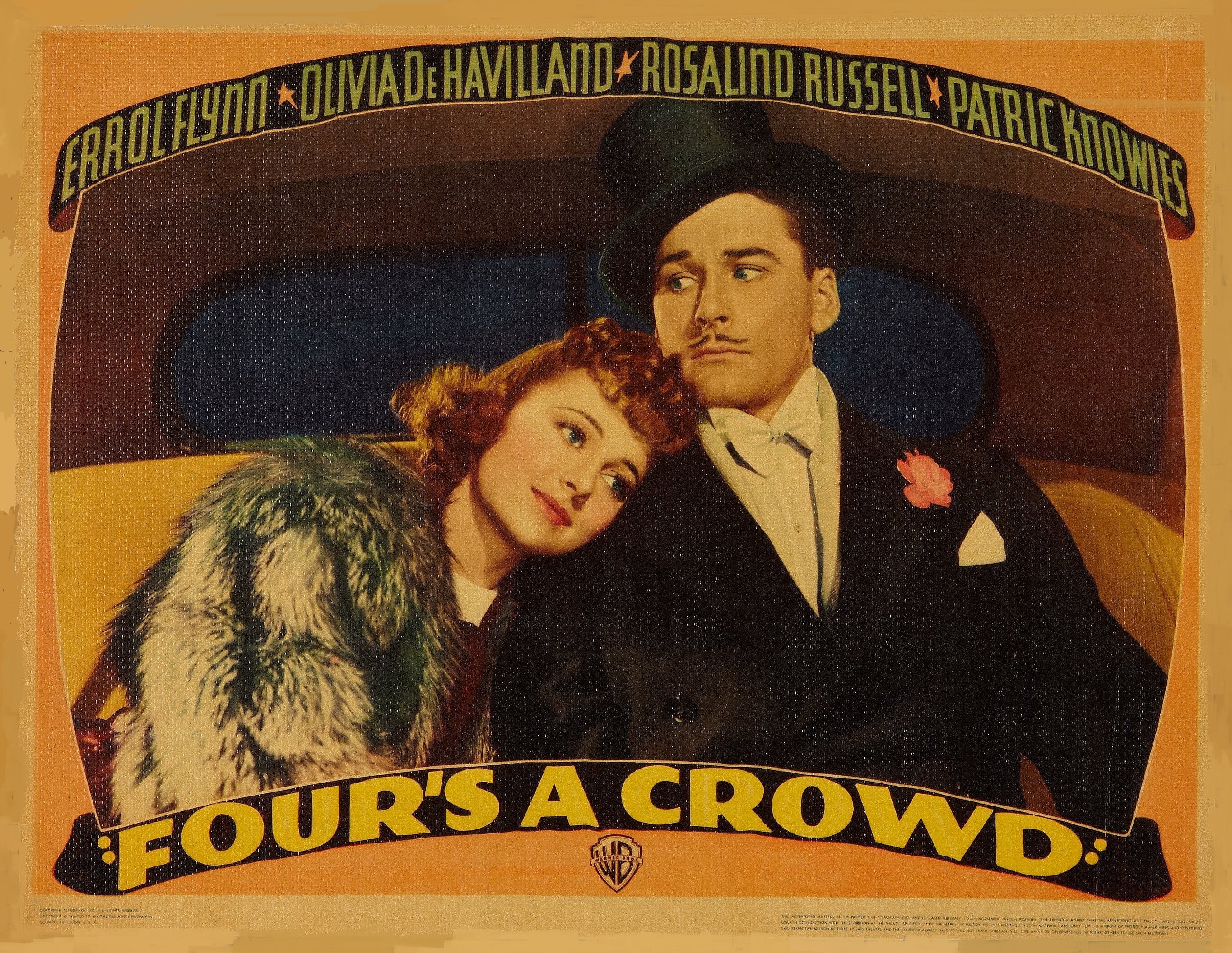 Olivia de Havilland and Errol Flynn in Four's a Crowd (1938)
