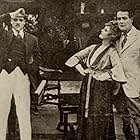 Jack Holt and Mary MacLaren in Saving the Family Name (1916)