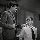 Humphrey Bogart and Clifton Young in Dark Passage (1947)