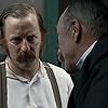 Ted Levine and David Wilmot in The Alienist (2018)