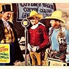 Gene Autry, Smiley Burnette, and Earle Hodgins in The Singing Cowboy (1936)