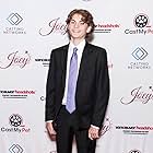 Tyler on the red carpet at the 2019 Joey Awards in Vancouver where he was won for his voice performance as Red on Charlie's Colorforms City.