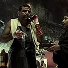 Paresh Rawal and Pravishi Das in No Smoking (2007)