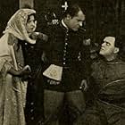 Earl Metcalfe, Howard M. Mitchell, and Sadie Calhoun in The Price of Jealousy (1913)