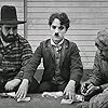 Charles Chaplin, Frank J. Coleman, and Tom Wilson in The Immigrant (1917)