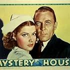 Dick Purcell and Ann Sheridan in Mystery House (1938)