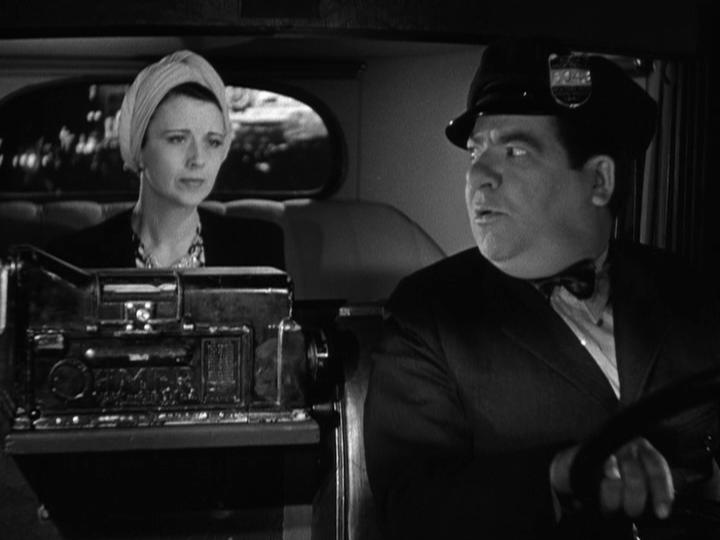 Bess Flowers and Frank Mills in You'll Find Out (1940)