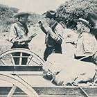 Judy Clark, Edmund Cobb, and Tom Keene in Desperadoes of the West (1950)