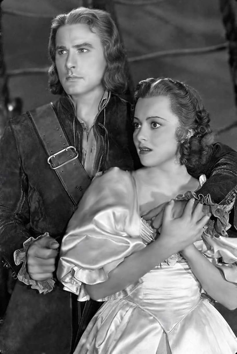 Olivia de Havilland and Errol Flynn in Captain Blood (1935)