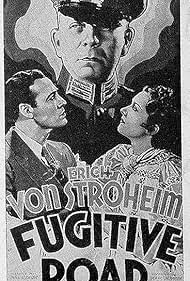 Erich von Stroheim, Wera Engels, and Leslie Fenton in Fugitive Road (1934)