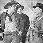 Brian Donlevy, Roy Barcroft, and Forrest Tucker in Ride the Man Down (1952)