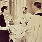 Nancy Carroll, Harry C. Bradley, Edmund Lowe, and Pat O'Malley in I Love That Man (1933)