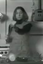 Martha Rosler in Semiotics of the Kitchen (1975)