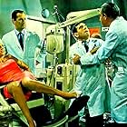 Ernest Clark, Pamela Conway, Francis Matthews, and Norman Wisdom in A Stitch in Time (1963)