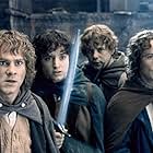 Sean Astin, Elijah Wood, Billy Boyd, and Dominic Monaghan in The Lord of the Rings: The Fellowship of the Ring (2001)