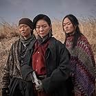 Esom, Lee Ho-jung, and Shin Hyun-ji in Escape (2024)