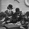 Charles Chaplin, Frank J. Coleman, and Tom Wilson in The Immigrant (1917)