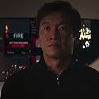 Chin Han in Skyscraper (2018)