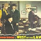 Tim McCoy, Roy Barcroft, Buck Jones, and Harry Woods in West of the Law (1942)