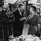 Clive Brook, Miriam Jordan, and Reginald Owen in Sherlock Holmes (1932)