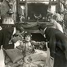 Theda Bara, Alice Gale, Walter Law, Alan Roscoe, and Claire Whitney in Camille (1917)