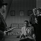 Stephen Dunne, Wilton Graff, Adele Jergens, and Berry Kroeger in The Dark Past (1948)