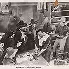 John Wayne, Tom Bay, Ben Corbett, Jim Corey, Blue Washington, and Harry Woods in Haunted Gold (1932)