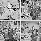 Johnny Arthur, Joe Devlin, Frank Faylen, Jean Porter, Bobby Watson, and Jiggs the Monkey in Nazty Nuisance (1943)