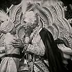 Kenneth Rive and Jean de Kuharski in Emerald of the East (1929)