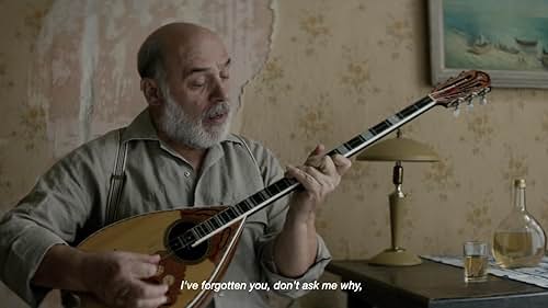 Something is about to change when a foreigner, constantly irritating his neighbour with bouzouki playing, loses his most precious possession.