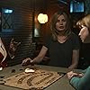 Geena Davis, Robert Emmet Lunney, and Sophie Thatcher in The Exorcist (2016)