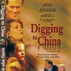 Kevin Bacon, Mary Stuart Masterson, Cathy Moriarty, and Evan Rachel Wood in Digging to China (1997)