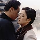 Gong Li and Derek Yee Tung-Sing in A Soul Haunted by Painting (1994)