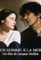 Marie Gillain and Jacques Higelin in Un homme à la mer (1993)