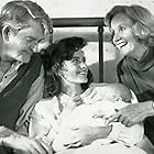 Courteney Cox, Hal Holbrook, and Eva Marie Saint in I'll Be Home for Christmas (1988)