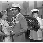 Genevieve Tobin, Theodore von Eltz, and Roland Young in Pleasure Cruise (1933)