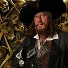 Geoffrey Rush in Pirates of the Caribbean: The Curse of the Black Pearl (2003)