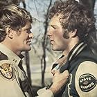 Timothy Bottoms and Bo Hopkins in A Small Town in Texas (1976)