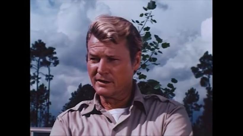 Claude King in Swamp Girl (1971)