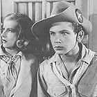 Frances Robinson and Frankie Thomas in Tim Tyler's Luck (1937)